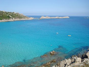 High angle view of sea shore against sky