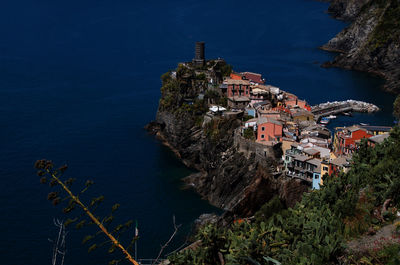 High angle view of townscape by sea