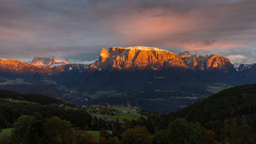 Scenic view of mountains against sky during sunset