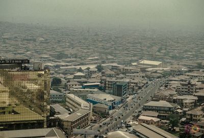 High angle view of buildings against sky in city