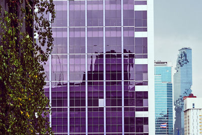 Low angle view of modern buildings against sky