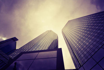 Low angle view of office building against sky