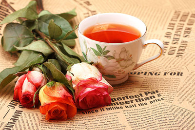 Close-up of red roses on table