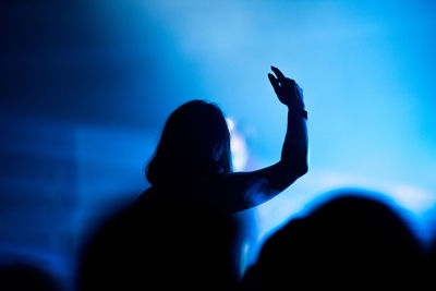 Silhouette people enjoying at music concert