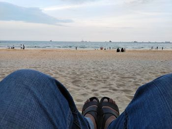 Low section of man on beach