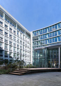 Modern building against blue sky