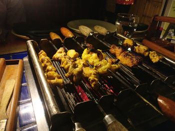 Close-up of meat on barbecue grill