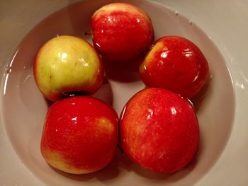 Close-up of strawberries in plate on table