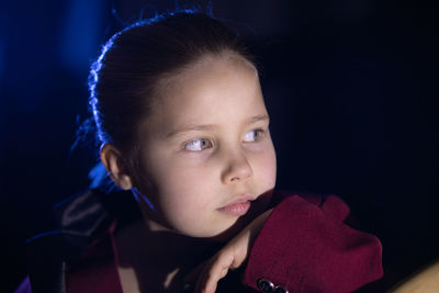 Close-up of girl looking away