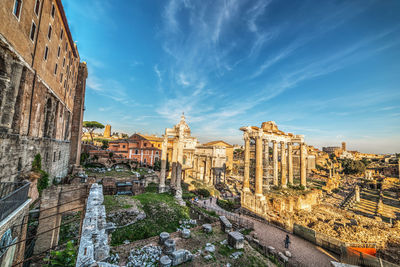 Panoramic view of buildings in city against sky