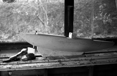 View of abandoned boat moored in sea