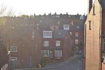 Buildings in city against sky