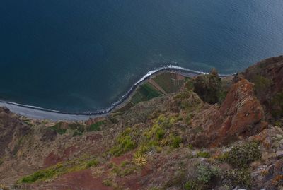 High angle view of road by sea