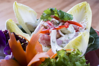 Close-up of chopped fruits in plate