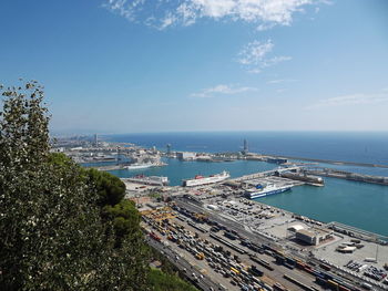 Harbor in sea against sky