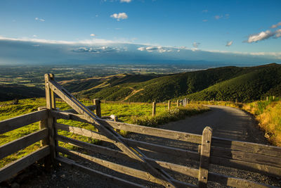 Scenic view of landscape against cloudy sky