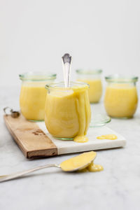 Close-up of drink in jar against white background