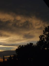 Scenic view of landscape against cloudy sky