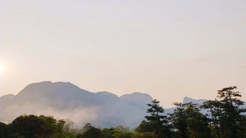 Scenic view of mountains against sky during sunset