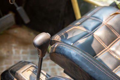 The gear lever is dusted inside of the dune buggy