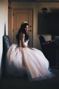 Portrait of bride wearing wedding dress