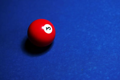 Close-up of red balls on pool table