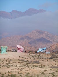 Scenic view of arid landscape, paint rocks, tafraout morocco.