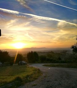 Scenic view of landscape against sky during sunset