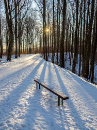 Snow covered landscape against sky at park during winter