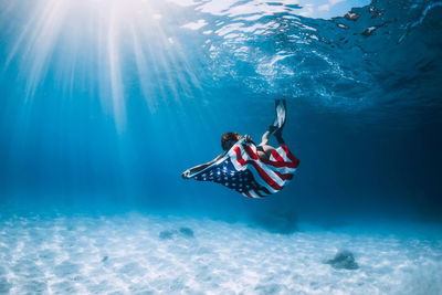 Man swimming in sea