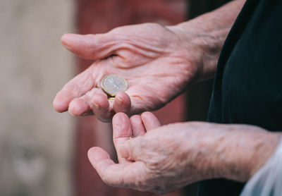 Close-up of hand holding hands