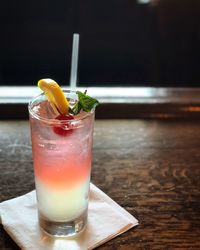 Close-up of cocktail in glass on table