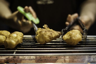 Close-up of meat on barbecue grill