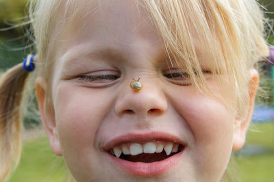 Close-up portrait of happy girl