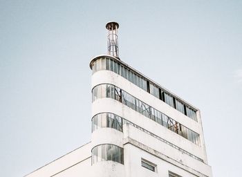 Low angle view of water tower against clear sky