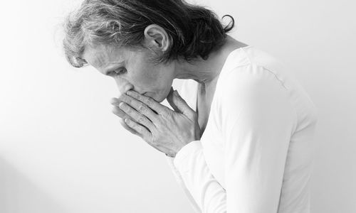 Close-up of woman hand on white background