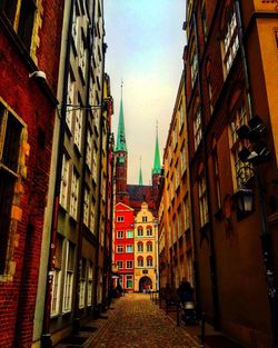 Narrow street along buildings