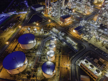 High angle view of illuminated buildings in city at night