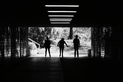 Women skating in tunnel