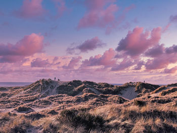 Scenic view of landscape against sky during sunset