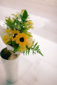 High angle view of white flower vase on table