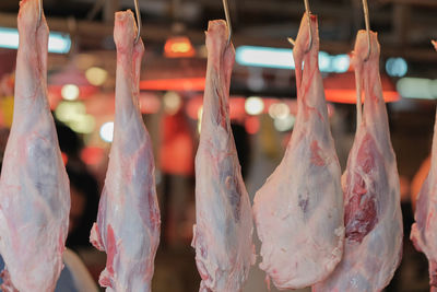 Close-up of ice cream hanging at market stall