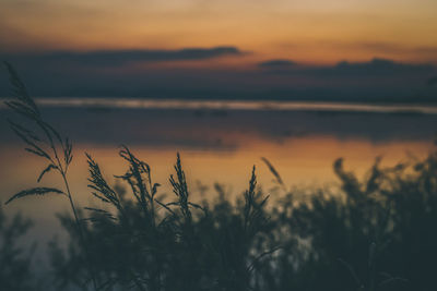 Long exposure vanilla colorful sky and lake reflection with mountains in the background