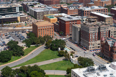 High angle view of street amidst buildings in city