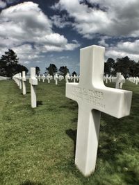 Tombstones on grassy field