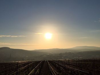 Scenic view of mountains against sky at sunset