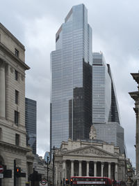 Low angle view of skyscrapers against sky