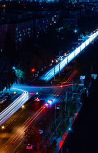 High angle view of illuminated cityscape at night