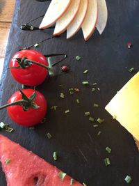 Close-up of red chili peppers on table