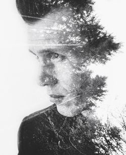Digital composite image of man and trees
